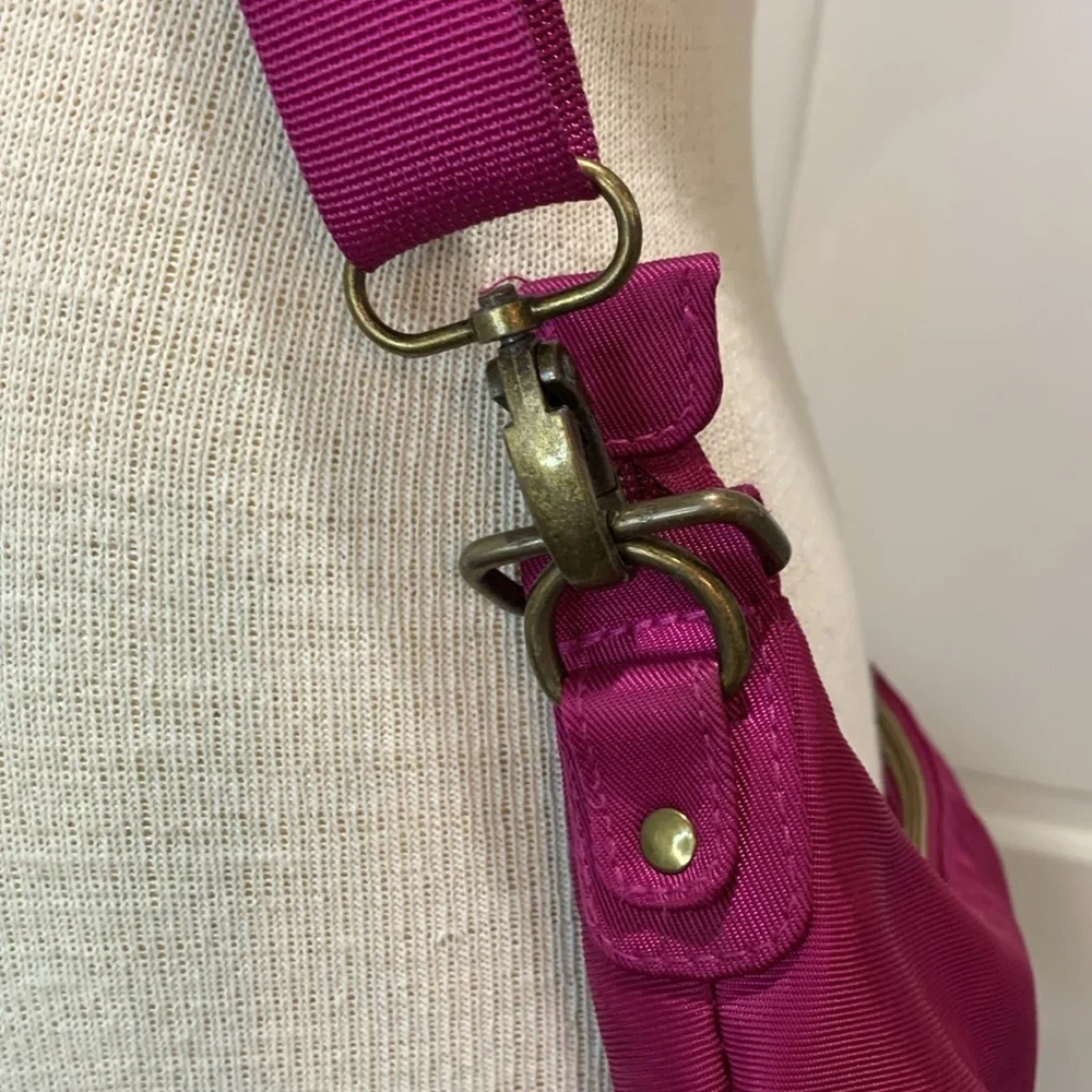 Travelon magenta cloth purse withh adjustable strap